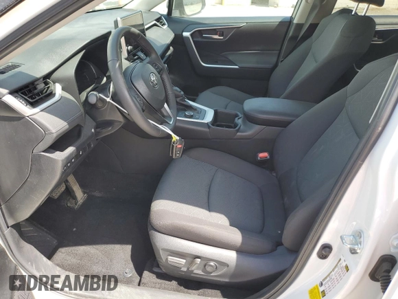 2024 Toyota RAV4 Hybrid LE with VIN 2T3UWRFV0RW227835, listed as a Copart auction lot 56447565 with 19,157 mi miles and Salvage title. Bid and sale history available at DreamBid. Image 7.