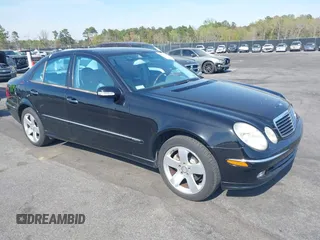 2003 Mercedes-Benz E-Class 3.2L with VIN WDBUF65J33A112308, listed as a IAAI auction lot 41871334 with 138,522 mi miles. Bid and sale history available at carsss.com. Image 1.