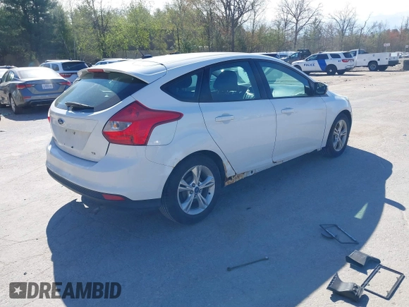 2013 Ford Focus SE with VIN 1FADP3K27DL128775, listed as a IAAI auction lot 42119223 with 138,846 mi miles. Bid and sale history available at carsss.com. Image 4.