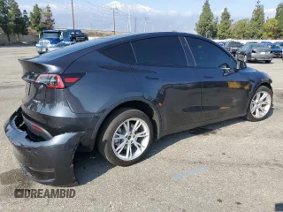 2024 Tesla Model Y Long Range with VIN 7SAYGAEE0RF018427, listed as a Copart auction lot 42455075 with 13,347 mi miles and Salvage Title. Bid and sale history available at DreamBid. Image 3.