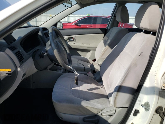 2009 Kia Spectra EX with VIN KNAFE221295654167, listed as a Copart auction lot 53377745 with 131,266 mi miles and Salvage Title. Bid and sale history available at DreamBid. Image 7.