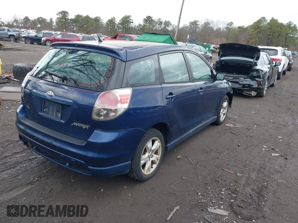 2006 Toyota Matrix STD with VIN 2T1KR32E26C596932, listed as a IAAI auction lot 41706466 with 241,246 mi miles. Bid and sale history available at carsss.com. Image 4.