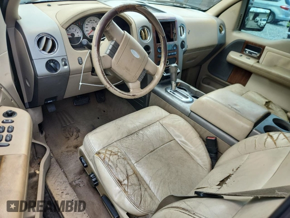 2004 Ford F-150 XL with VIN 1FTPX12564NA87792, listed as a Copart auction lot 60489655 with 396,269 mi miles and Salvage title. Bid and sale history available at DreamBid. Image 8.
