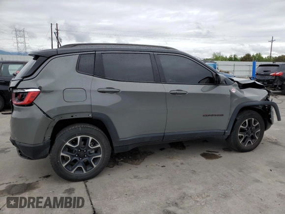 2021 Jeep Compass Trailhawk with VIN 3C4NJDDB9MT594344, listed as a Copart auction lot 58821455 with 80,039 mi miles and Salvage title. Bid and sale history available at DreamBid. Image 3.