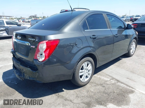 2014 Chevrolet Sonic LT with VIN 1G1JC5SB7E4146444, listed as a IAAI auction lot 42014386 with 85,122 mi miles and . Bid and sale history available at DreamBid. Image 4.