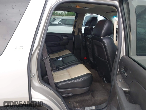 2007 Chevrolet Tahoe LS with VIN 1GNFC13C57R417897, listed as a IAAI auction lot 42588952 with 212,919 mi miles and . Bid and sale history available at DreamBid. Image 8.