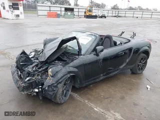 2002 Toyota MR2 Spyder with VIN JTDFR320720045244, listed as a IAAI auction lot 40486938 with 61,802 mi miles. Bid and sale history available at carsss.com. Image 2.
