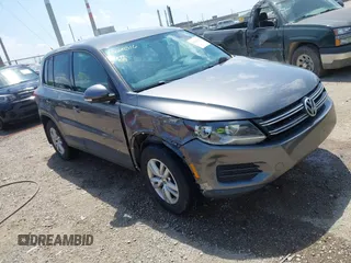 2012 Volkswagen Tiguan SE z VIN WVGAV7AX9CW004362, wystawiony jako IAAI lot #42260316 z przebiegiem 163 444 mil mil oraz . Historia ofert i sprzedaży dostępna na DreamBid. Obrazek 1.