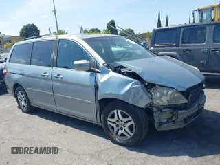 2006 Honda Odyssey EX-L z VIN 5FNRL38786B113190, wystawiony jako IAAI lot #42489841 z przebiegiem 177 551 mil mil oraz . Historia ofert i sprzedaży dostępna na DreamBid. Obrazek 1.