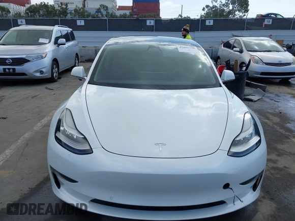 2020 Tesla Model 3 Long Range with VIN 5YJ3E1EB9LF795246, listed as a IAAI auction lot 41895750 with 163,061 mi miles and . Bid and sale history available at DreamBid. Image 13.