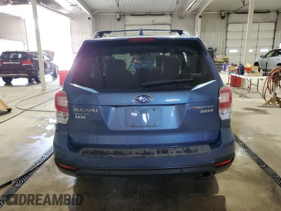 2017 Subaru Forester Touring z VIN JF2SJAWC9HH564242, wystawiony jako Copart lot #59209265 z przebiegiem Nie podano mil oraz Szkoda całkowita • Salvage title. Historia ofert i sprzedaży dostępna na DreamBid. Obrazek 6.