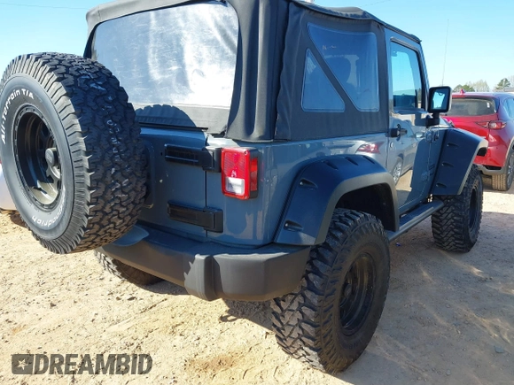 2015 Jeep Wrangler Sport with VIN 1C4AJWAG0FL591213, listed as a IAAI auction lot 41893306 with 107,807 mi miles and . Bid and sale history available at DreamBid. Image 4.