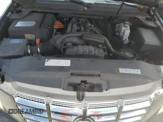 2009 Cadillac Escalade z VIN 1GYFK43539R196408, wystawiony jako Copart lot #60207045 z przebiegiem 79 329 mil mil oraz Czysty tytuł • Clean title. Historia ofert i sprzedaży dostępna na DreamBid. Obrazek 11.
