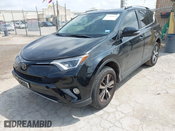 2018 Toyota RAV4 XLE z VIN 2T3WFREV4JW495379, wystawiony jako IAAI lot #42406849 z przebiegiem 132 126 mil mil oraz . Historia ofert i sprzedaży dostępna na DreamBid. Obrazek 18.