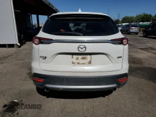 2017 Mazda CX-9 Signature with VIN JM3TCBEY4H0129361, listed as a Copart auction lot 56929295 with 96,686 mi miles and Salvage title. Bid and sale history available at DreamBid. Image 6.
