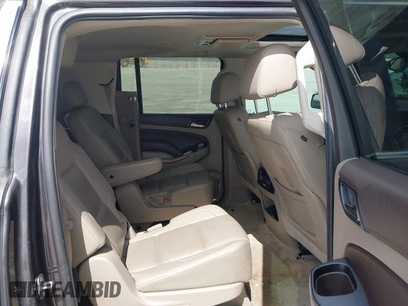 2015 Chevrolet Suburban LTZ with VIN 1GNSCKKC9FR500933, listed as a IAAI auction lot 41830980 with 169,217 mi miles and . Bid and sale history available at DreamBid. Image 8.