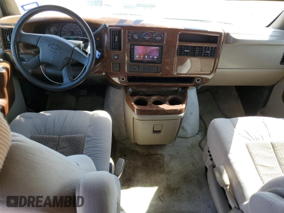 2007 Chevrolet Express Passenger z VIN 1GBFG15T471230597, wystawiony jako Copart lot #46646695 z przebiegiem 154 251 mil mil oraz Szkoda całkowita • Salvage title. Historia ofert i sprzedaży dostępna na DreamBid. Obrazek 8.