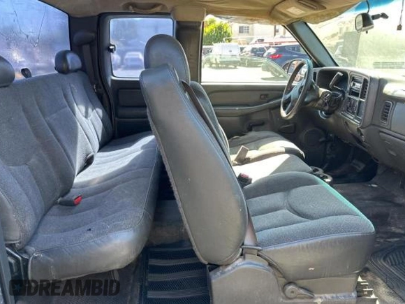 2003 GMC Sierra 1500 with VIN 2GTEC19X731239346, listed as a Copart auction lot 77679104 with 163,029 mi miles and Clean Title. Bid and sale history available at DreamBid. Image 6.