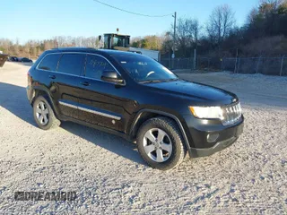 2012 Jeep Grand Cherokee Laredo with VIN 1C4RJFAG3CC246577, listed as a IAAI auction lot 41807693 with 164,574 mi miles. Bid and sale history available at carsss.com. Image 1.