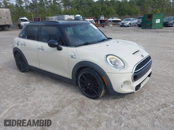 2017 MINI Hardtop 4 Door Cooper S z VIN WMWXU3C54H2D32602, wystawiony jako IAAI lot #41458333 z przebiegiem 124 235 mil mil oraz . Historia ofert i sprzedaży dostępna na DreamBid. Obrazek 1.