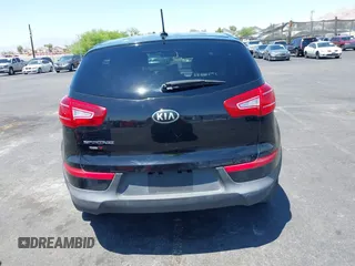 2013 Kia Sportage LX with VIN KNDPBCA25D7449584, listed as a IAAI auction lot 42489414 with 100,993 mi miles and . Bid and sale history available at DreamBid. Image 16.