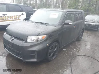 2012 Scion xB with VIN JTLZE4FE3CJ008728, listed as a IAAI auction lot 42000043 with 172,199 mi miles. Bid and sale history available at carsss.com. Image 2.