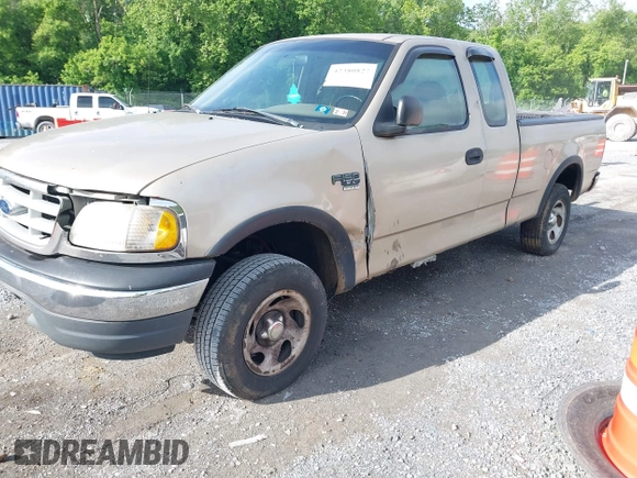 1999 Ford F-150 z VIN 1FTRX18W9XNB33354, wystawiony jako IAAI lot #42380827 z przebiegiem Nie podano mil oraz . Historia ofert i sprzedaży dostępna na DreamBid. Obrazek 2.