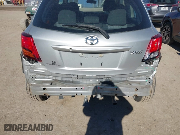 2015 Toyota Yaris L with VIN VNKJTUD38FA020465, listed as a IAAI auction lot 41416577 with 142,751 mi miles and . Bid and sale history available at DreamBid. Image 6.