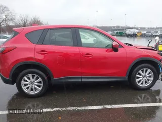2015 Mazda CX-5 Touring with VIN JM3KE4CY3F0529669, listed as a IAAI auction lot 41866873 with 137,635 mi miles and . Bid and sale history available at carsss.com. Image 17.