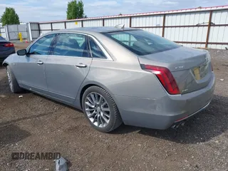 2018 Cadillac CT6 Luxury AWD z VIN 1G6KD5RS6JU101040, wystawiony jako IAAI lot #42271248 z przebiegiem 88 470 mil mil oraz . Historia ofert i sprzedaży dostępna na DreamBid. Obrazek 3.