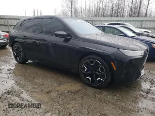 2022 BMW iX xDrive50 z VIN WB523CF05NCK44298, wystawiony jako Copart lot #45008714 z przebiegiem 14 562 mil mil oraz . Historia ofert i sprzedaży dostępna na DreamBid. Obrazek 4.