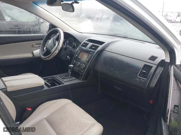 2015 Mazda CX-9 Touring with VIN JM3TB2CA1F0449033, listed as a IAAI auction lot 41549205 with 95,106 mi miles. Bid and sale history available at carsss.com. Image 5.