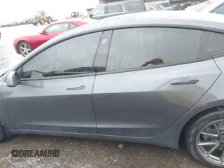 2023 Tesla Model 3 z VIN 5YJ3E1EA3PF579776, wystawiony jako IAAI lot #41537794 z przebiegiem Nie podano mil oraz . Historia ofert i sprzedaży dostępna na DreamBid. Obrazek 14.