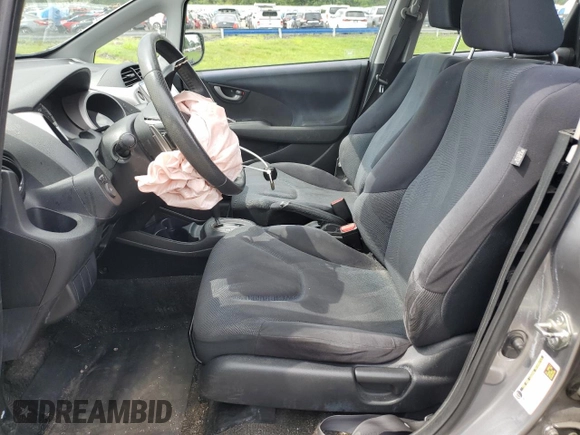 2009 Honda Fit Sport with VIN JHMGE88439S029286, listed as a Copart auction lot 63357784 with 112,705 mi miles and Salvage Title. Bid and sale history available at carsss.com. Image 7.