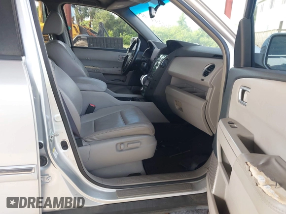2009 Honda Pilot Touring z VIN 5FNYF38839B022943, wystawiony jako IAAI lot #42443006 z przebiegiem 199 184 mil mil oraz . Historia ofert i sprzedaży dostępna na DreamBid. Obrazek 5.