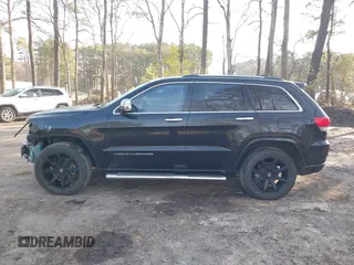 2015 Jeep Grand Cherokee Overland with VIN 1C4RJECGXFC957530, listed as a IAAI auction lot 41633522 with 168,258 mi miles and . Bid and sale history available at DreamBid. Image 14.