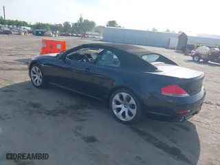 2007 BMW 6 Series 650i with VIN WBAEK13587CN83369, listed as a IAAI auction lot 42103223 with 106,119 mi miles. Bid and sale history available at carsss.com. Image 3.