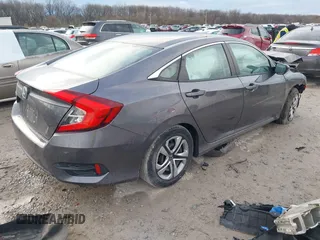 2016 Honda Civic Sedan LX with VIN 19XFC2F52GE009350, listed as a IAAI auction lot 41907696 with 141,306 mi miles. Bid and sale history available at carsss.com. Image 4.