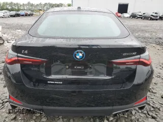 2024 BMW i4 eDrive35 with VIN WBY43AW05RFS84773, listed as a Copart auction lot 54974024 with 2,942 mi miles and Salvage Title. Bid and sale history available at carsss.com. Image 6.