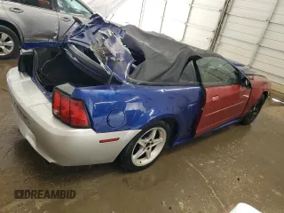 2004 Ford Mustang Deluxe with VIN 1FAFP44684F189081, listed as a Copart auction lot 59474985 with 249,812 mi miles and Salvage title. Bid and sale history available at DreamBid. Image 3.