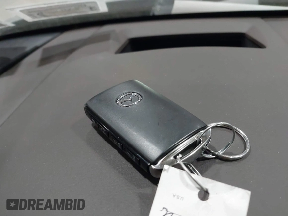 2025 Mazda CX-30 S Premium with VIN 3MVDMBDM5SM788786, listed as a IAAI auction lot 42126428 with 1,370 mi miles and . Bid and sale history available at DreamBid. Image 11.