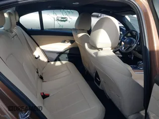 2019 BMW 3 Series 330i with VIN WBA5R1C56KAK08371, listed as a IAAI auction lot 41671953 with 52,433 mi miles and . Bid and sale history available at DreamBid. Image 8.