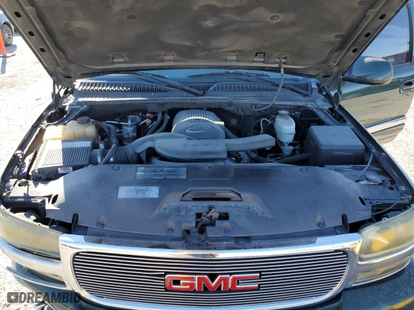 2004 GMC Yukon SLT with VIN 1GKEC13T94R173580, listed as a Copart auction lot 88712415 with 174,011 mi miles and Salvage Title. Bid and sale history available at carsss.com. Image 12.