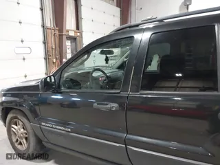 2003 Jeep Grand Cherokee Laredo with VIN 1J4GW48S63C552366, listed as a IAAI auction lot 41861501 with 227,464 mi miles. Bid and sale history available at carsss.com. Image 12.