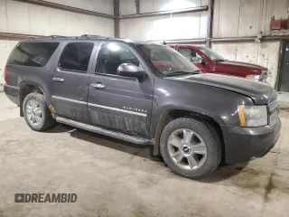 2010 Chevrolet Suburban LTZ with VIN 1GNUKKE3XAR244933, listed as a Copart auction lot 85247514 with 200,732 mi miles and Salvage Title. Bid and sale history available at carsss.com. Image 4.