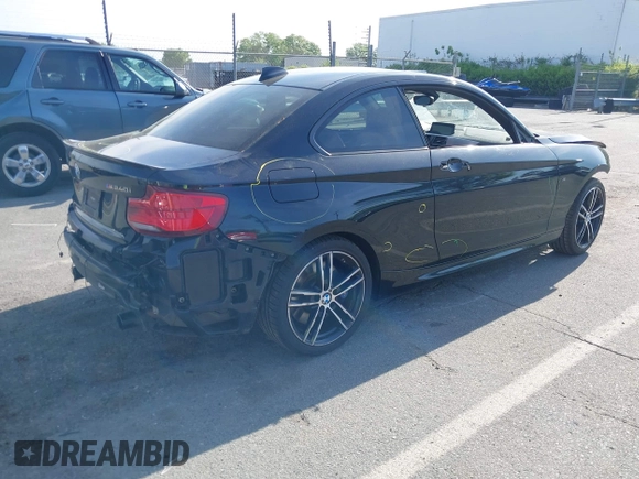 2019 BMW 2 Series M240i with VIN WBA2J5C55KVC07855, listed as a IAAI auction lot 42014318 with 68,640 mi miles and . Bid and sale history available at carsss.com. Image 4.