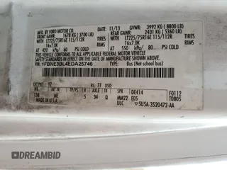 2014 Ford Econoline Passenger XL with VIN 1FBNE3BL4EDA25746, listed as a Copart auction lot 69606994 with 107,842 mi miles and Salvage Title. Bid and sale history available at carsss.com. Image 15.