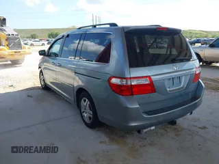 2007 Honda Odyssey EX-L z VIN 5FNRL38657B116038, wystawiony jako IAAI lot #42365429 z przebiegiem 177 518 mil mil oraz . Historia ofert i sprzedaży dostępna na DreamBid. Obrazek 3.