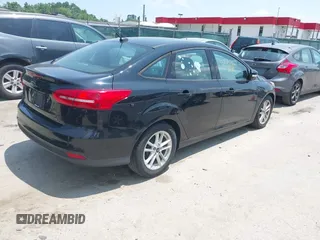 2016 Ford Focus SE с VIN 1FADP3F25GL303071, выставлен на аукционе IAAI как лот 42457227 с пробегом 128 268 миль миль и . История ставок и продаж доступна на DreamBid. Изображение 4.