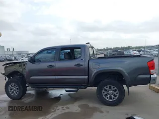 2017 Toyota Tacoma SR5 with VIN 5TFAZ5CN4HX047095, listed as a IAAI auction lot 41951364 with 127,706 mi miles and . Bid and sale history available at DreamBid. Image 15.